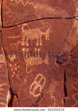 petroglyphs carved, pecked or abraded out of rock by native