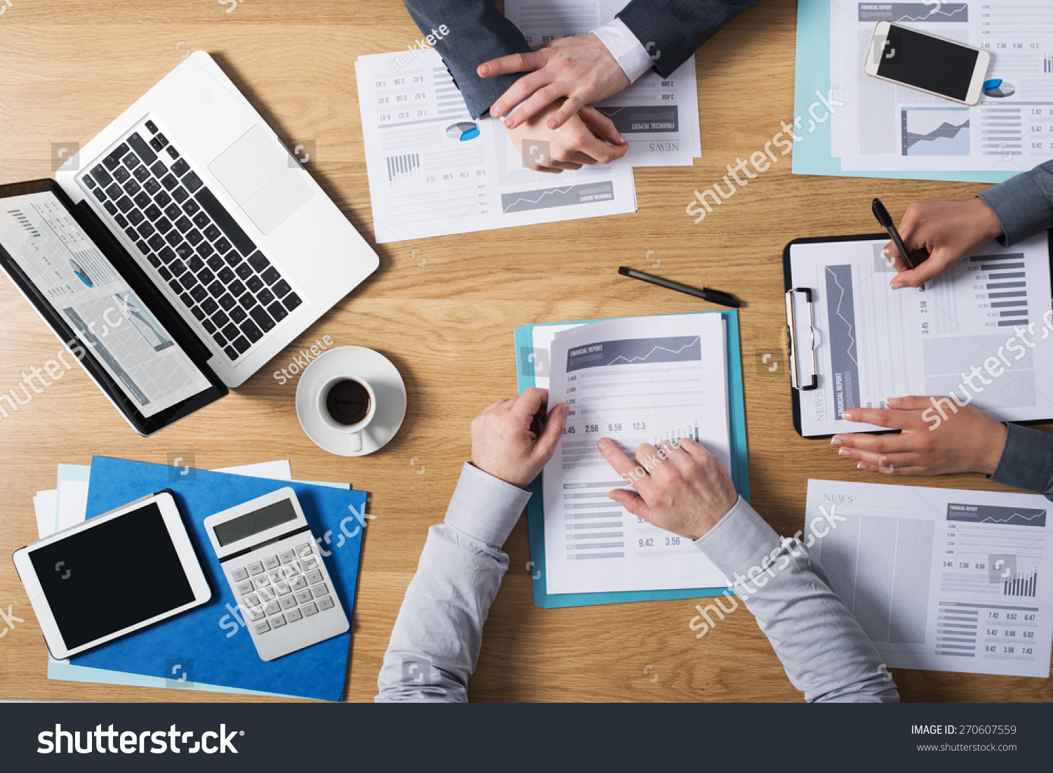 business people team working together at office desk with laptop